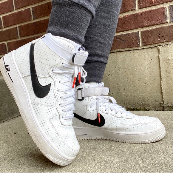 white nike high tops with black swoosh